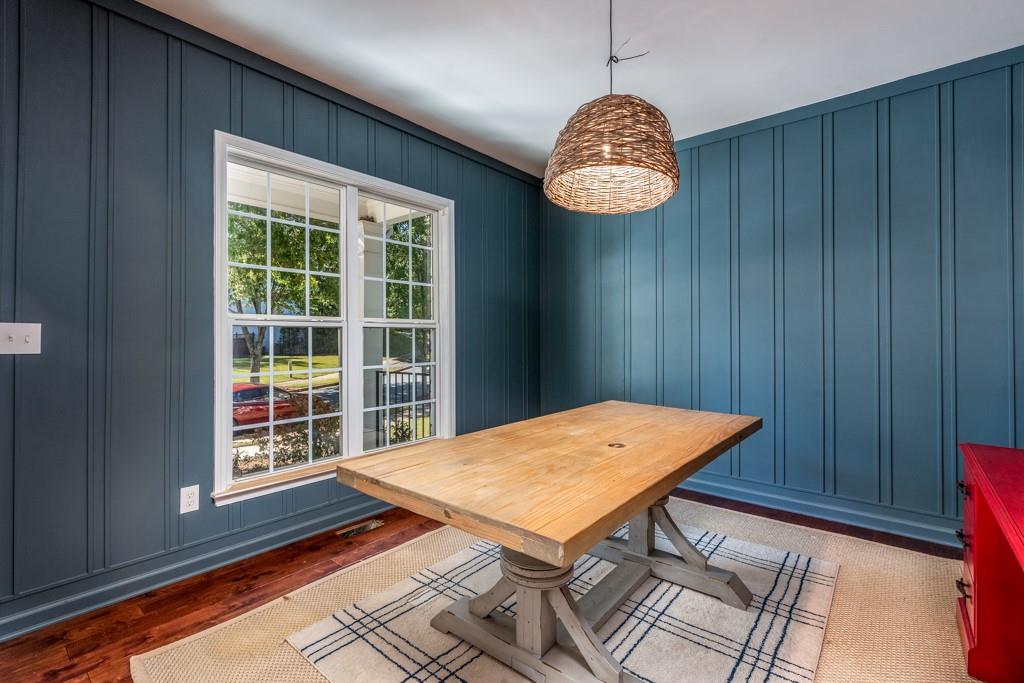 146 Edgewater Trail Canton, GA 30115 - Photo 4 of 25 a view of a room with a table and chairs