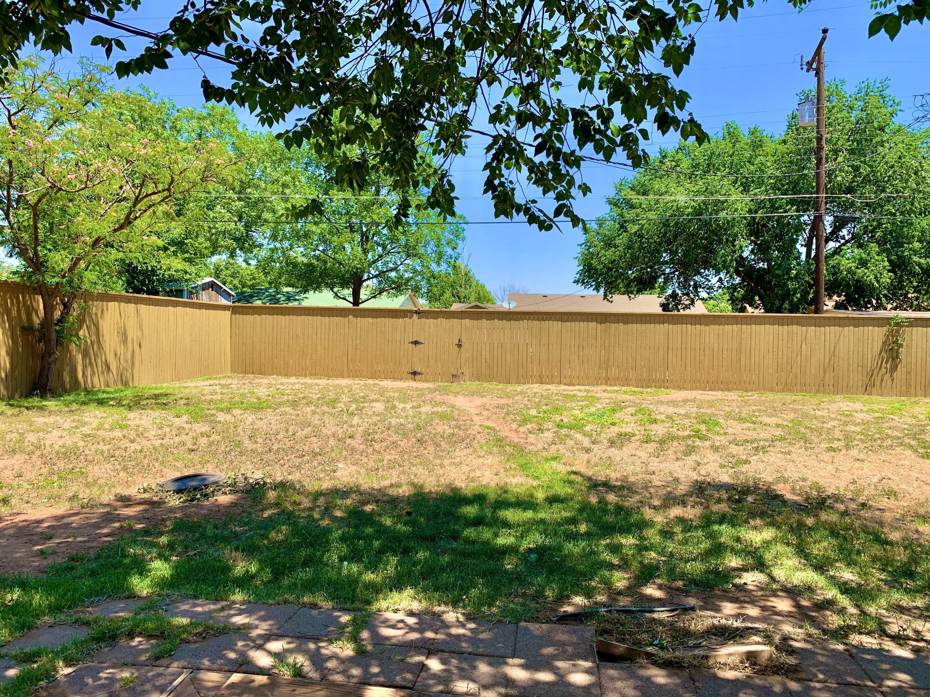 2510 39th Street Lubbock, TX 79413 - Photo 11 of 12 a view of an outdoor space and swimming pool