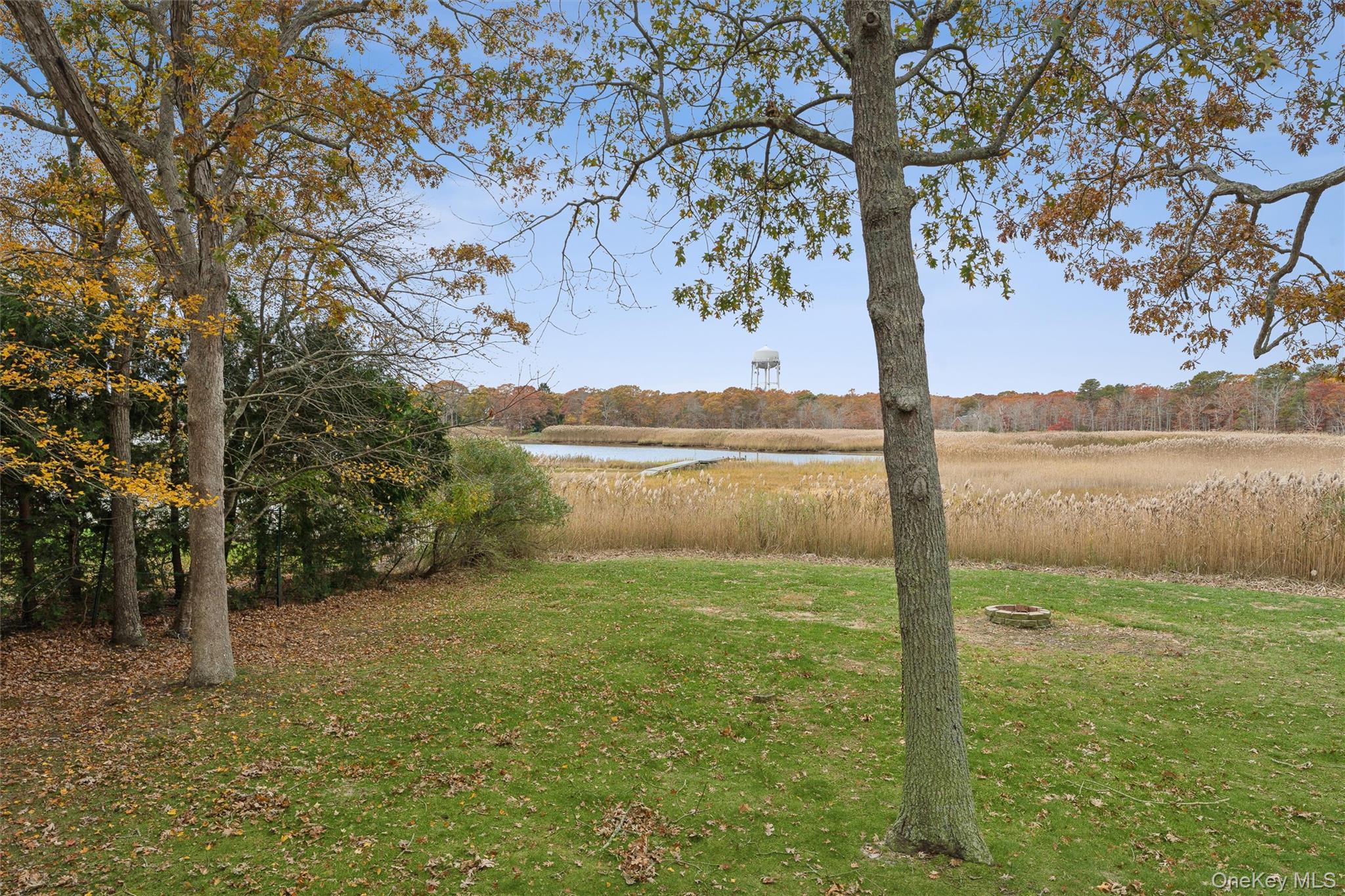 23 Old Main Road Quogue, NY 11959 - Photo 6 of 19 a view of lake with green space