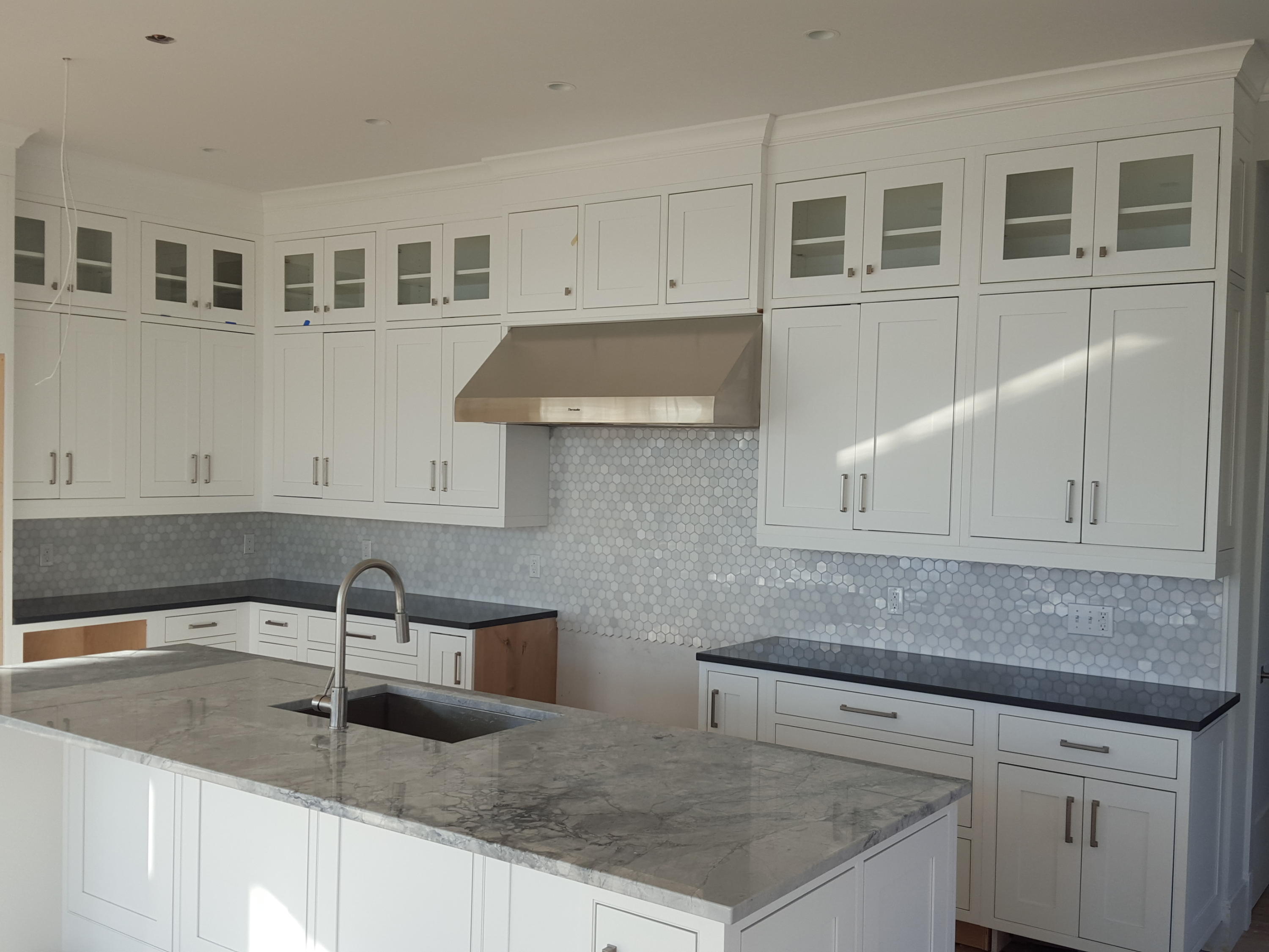 23 Crescent Beach Road Rowayton, CT 06853 - Photo 5 of 34 a kitchen with granite countertop a sink and cabinets