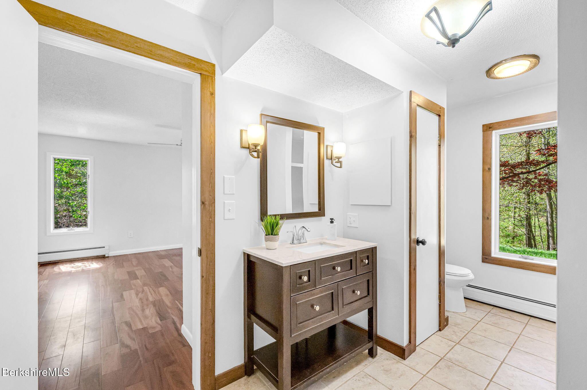 1874 Home Road Sheffield, MA 01230 - Photo 36 of 42 a bathroom with a double vanity sink and a mirror