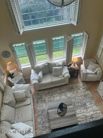 a balcony with wooden floor