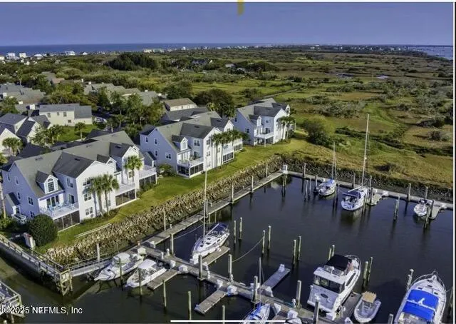 a bathroom with a sink vanity and mirror