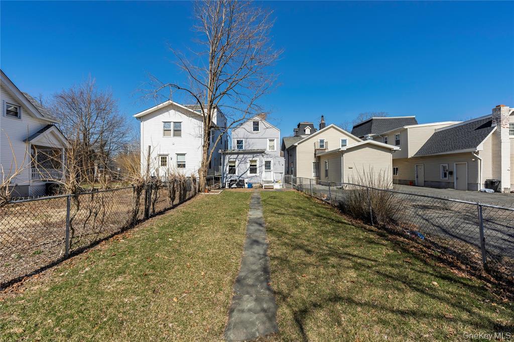 239 Main Street, Unit 1 Cornwall, NY 12518 - Photo 11 of 11 a view of a house with a yard