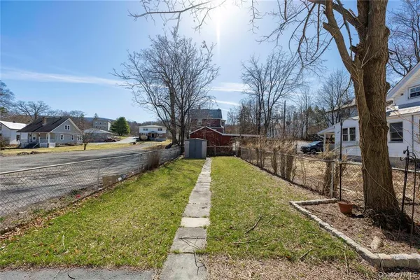 a view of yard with large tree