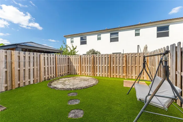 a view of a backyard with a garden