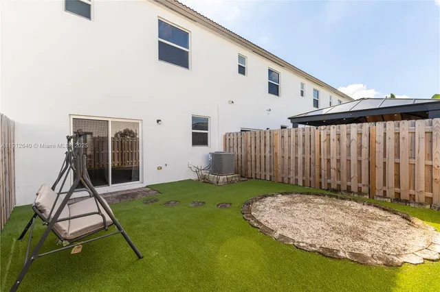 a bed room with a bed and a dresser
