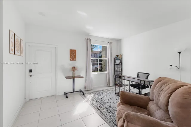 a bathroom with a sink mirror and toilet