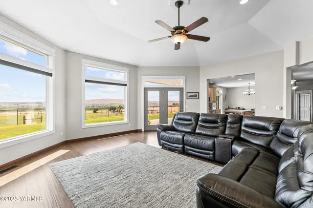 a living room with furniture and a window