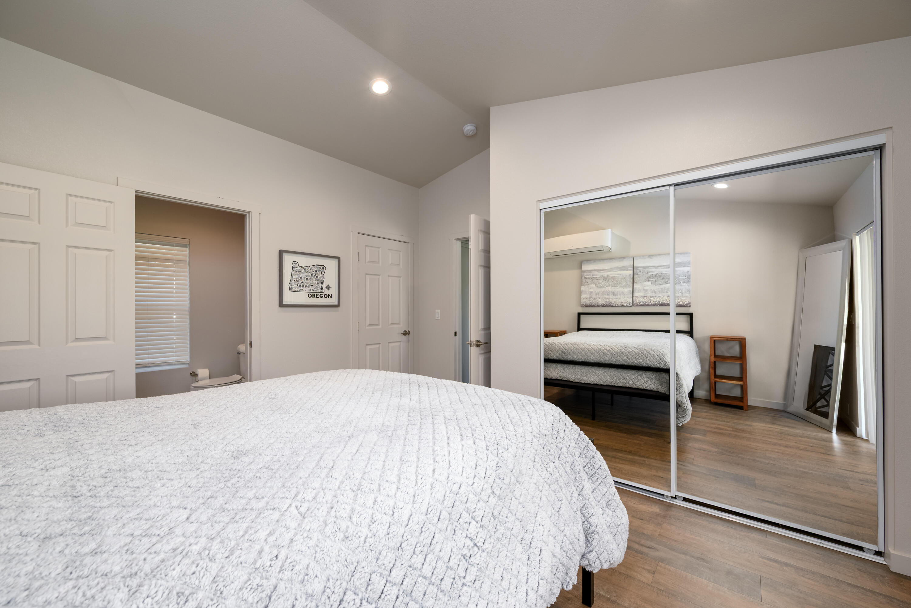 2546 Fisher Road Roseburg, OR 97471 - Photo 44 of 59 a bedroom with a bed and a large mirror