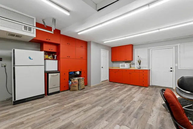 a room with furniture and wooden floor