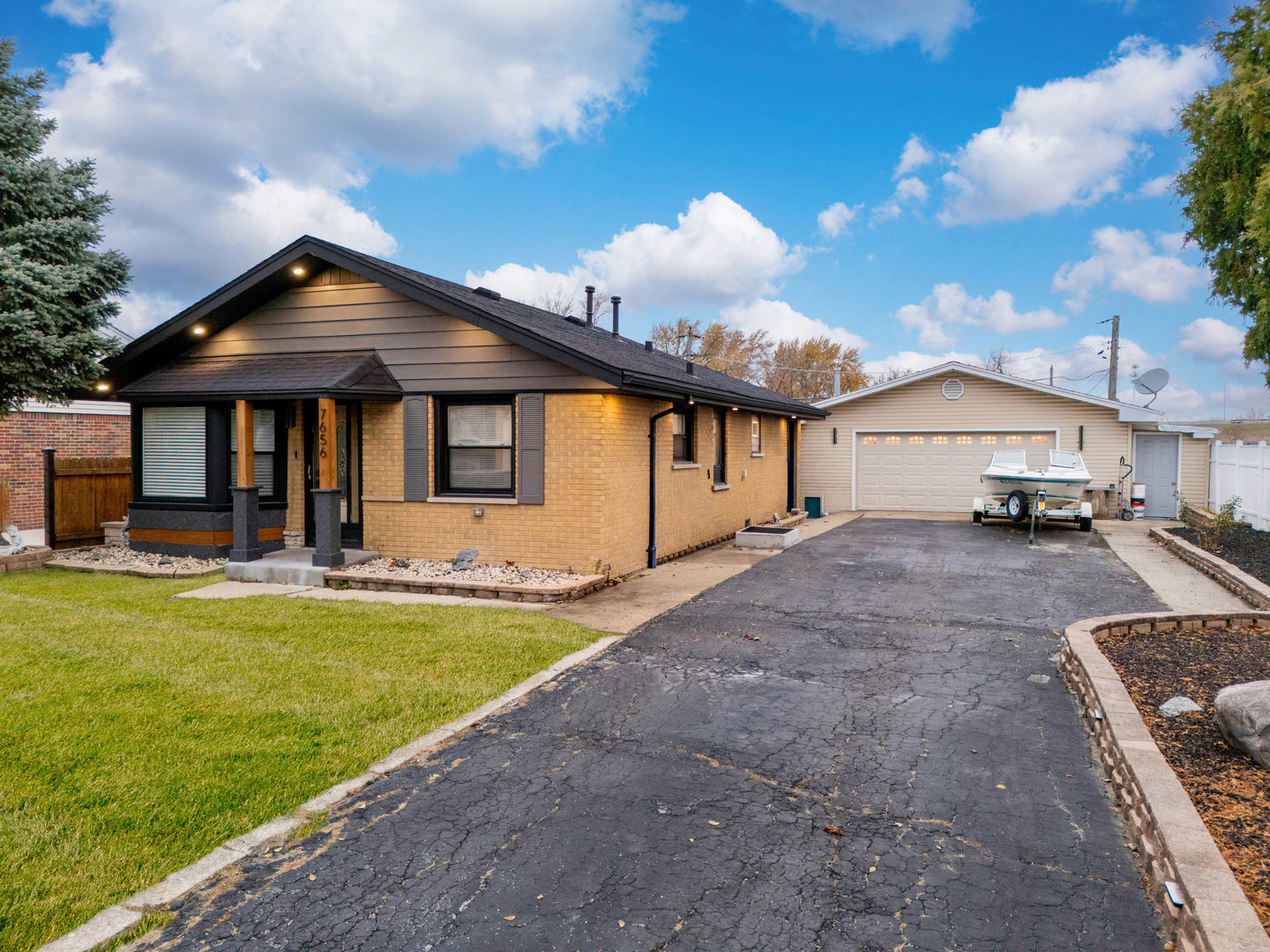 7656 80th Place Bridgeview, IL 60455 - Photo 33 of 39 a view of a house with backyard and sitting area