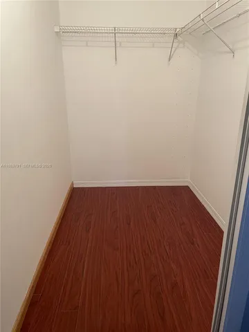 a room with furniture and a flat screen tv