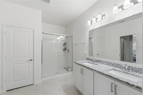 a view of a garden with an outdoor seating