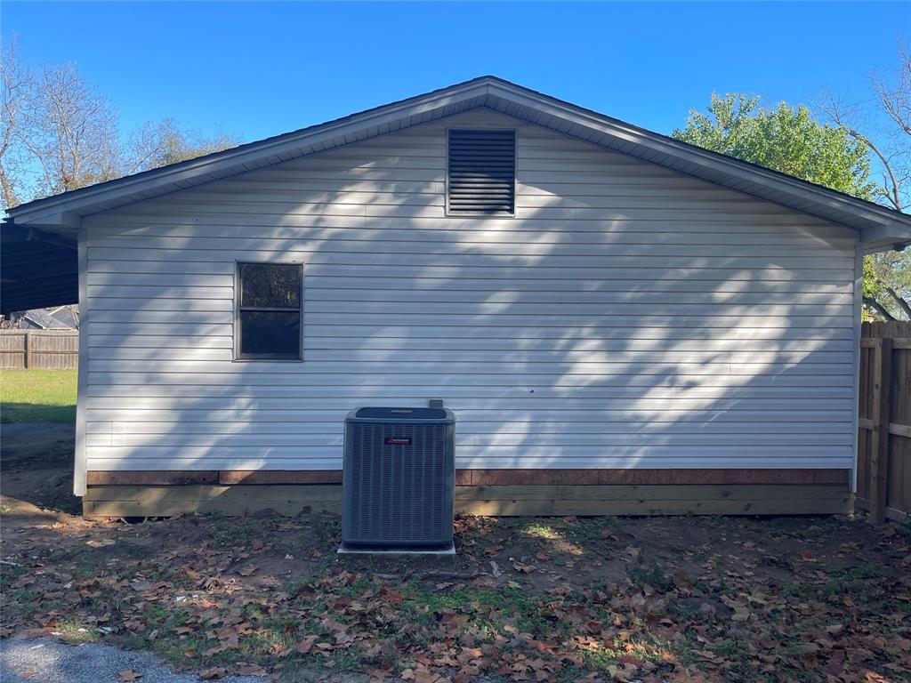 301 Walnut Street Chandler, TX 75758 - Photo 12 of 13 a view of front door of house