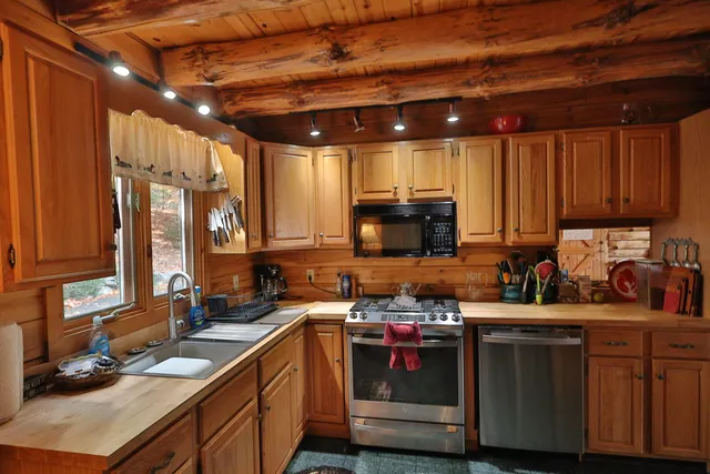 $999,000 | 567 Big Moose Point Road, Greenville Junction, ME 04442