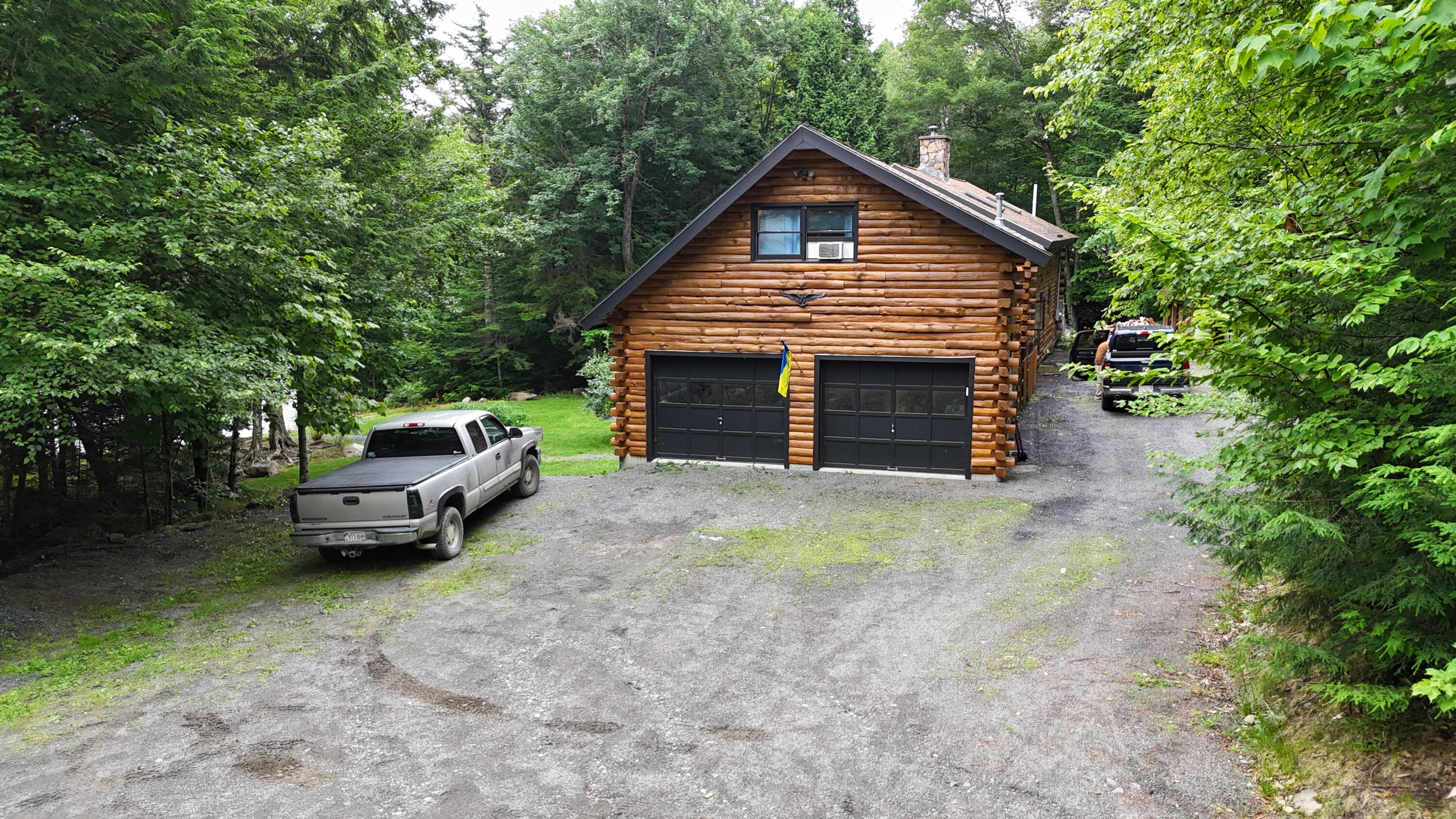 567 Big Moose Point Road Greenville Junction, ME 04442 - Photo 4 of 57 dji_fly_20250720_145552_0941_17530379864