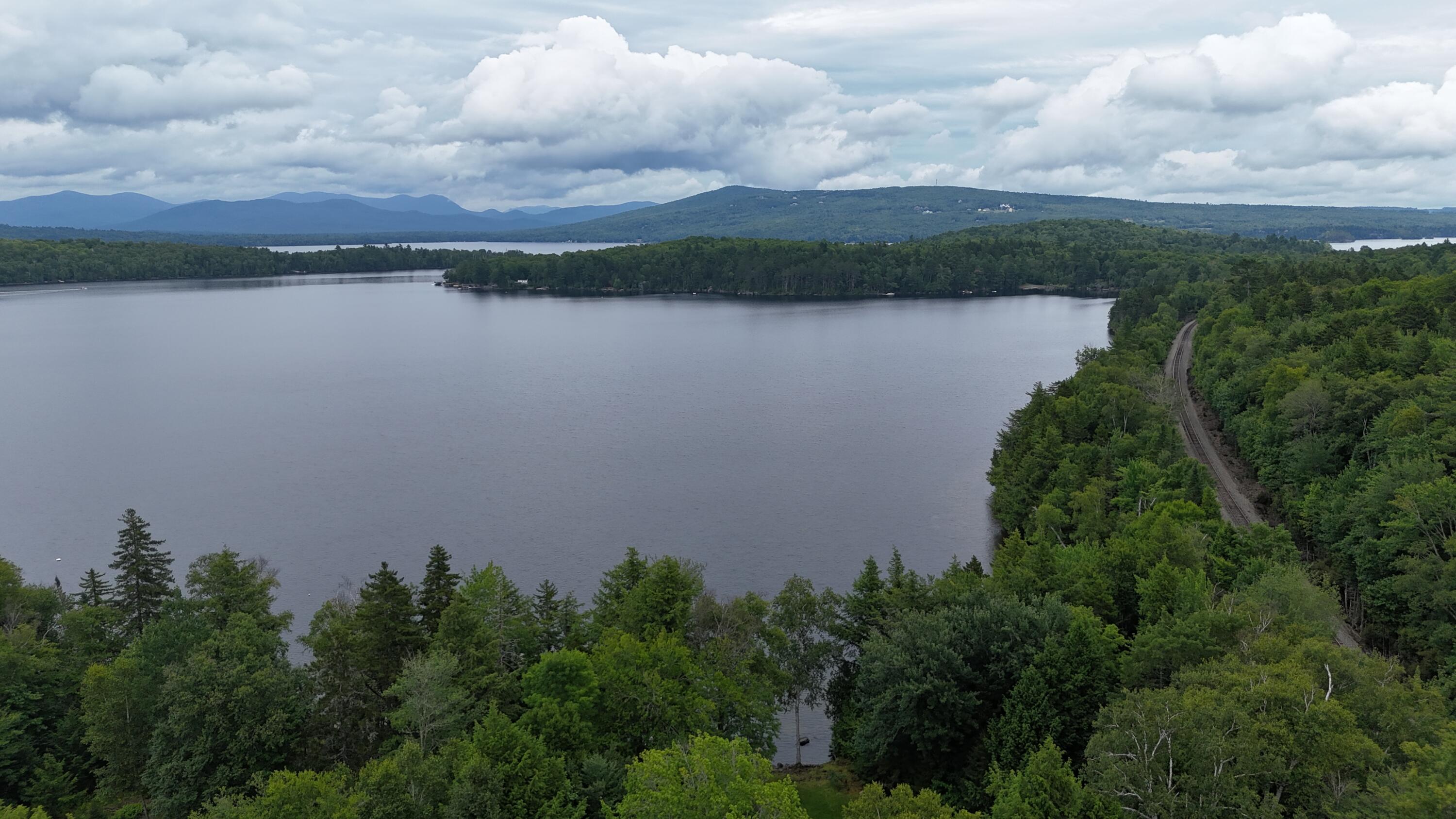 567 Big Moose Point Road Greenville Junction, ME 04442 - Photo 6 of 57 dji_fly_20250720_145652_0946_17530379730