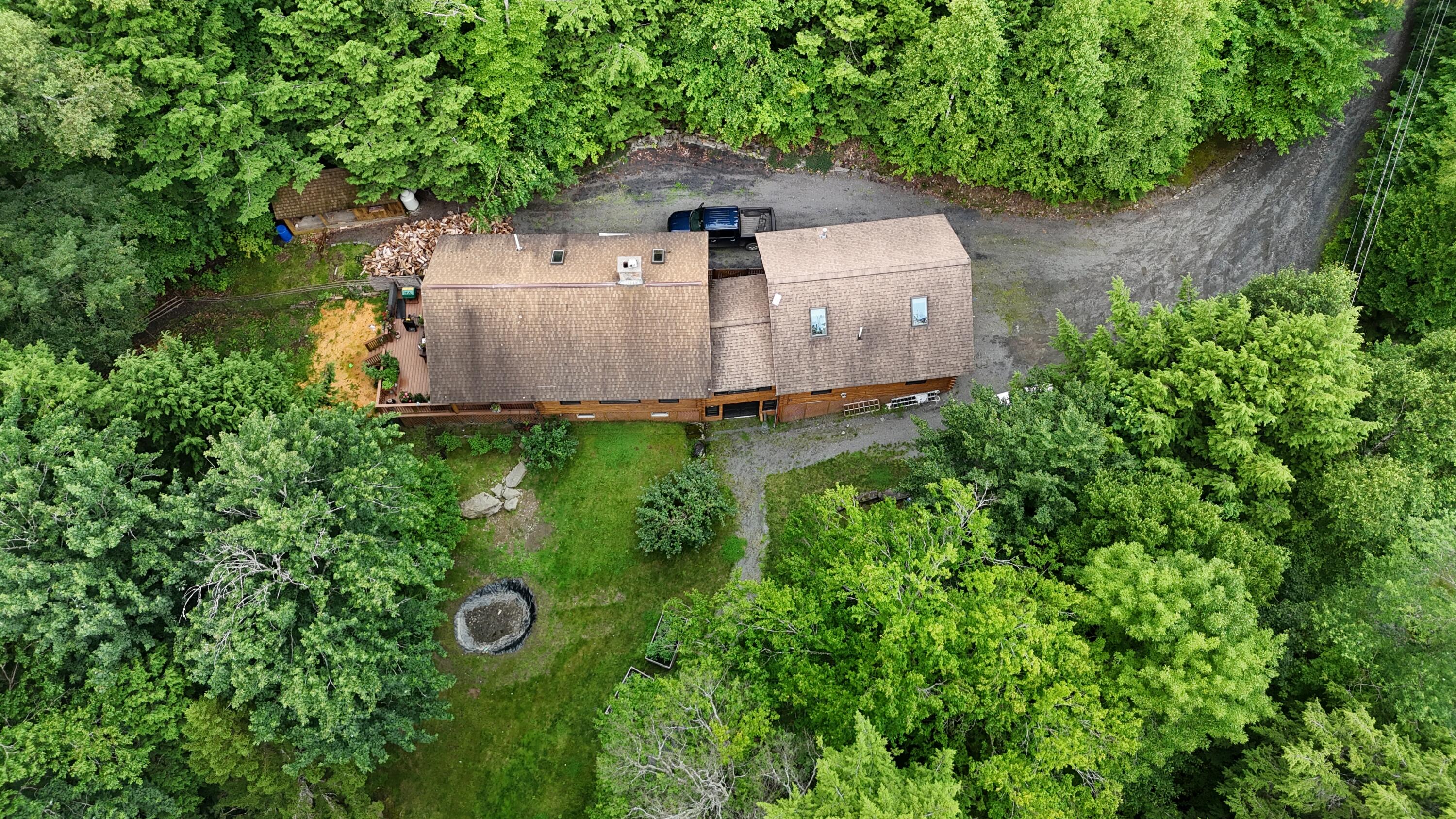 567 Big Moose Point Road Greenville Junction, ME 04442 - Photo 8 of 57 dji_fly_20250720_145816_0952_17530379571