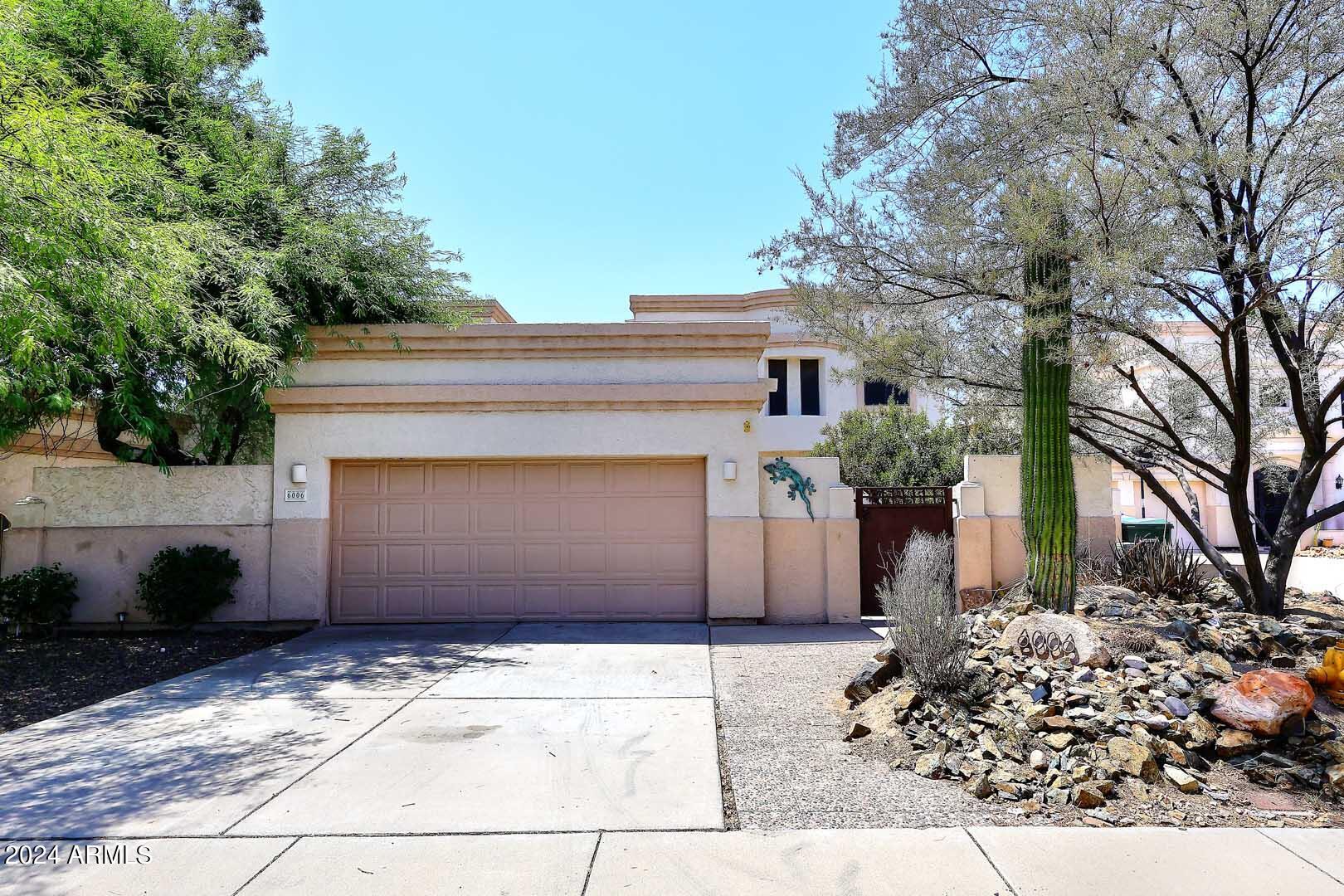 6006 North 5th Place Phoenix, AZ 85014 - Photo 1 of 34 a front view of a house