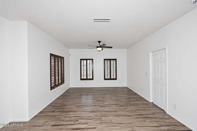 wooden floor in a hall with an entryway