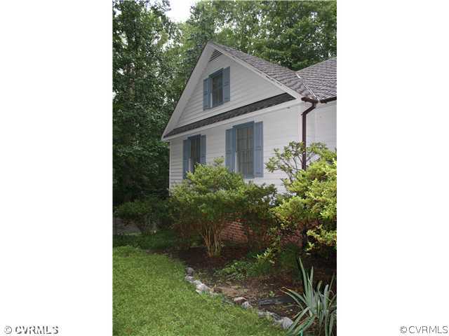 14720 Swift Water Road Chesterfield, VA 23838 - Photo 2 of 12 a view of a small yard in front of a house