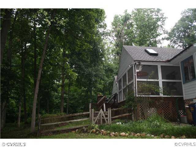 14720 Swift Water Road Chesterfield, VA 23838 - Photo 3 of 12 a house view with a garden space