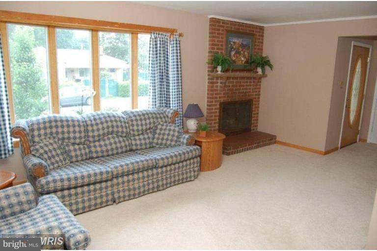 212 Dale Road Pasadena, MD 21122 - Photo 6 of 21 Living Room w/Fireplace