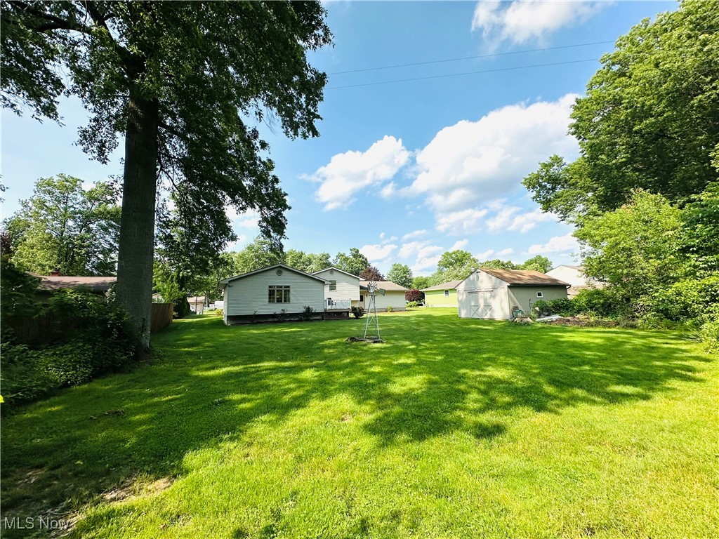 1684 Morris Street Mineral Ridge, OH 44440 - Photo 3 of 50 View of green lawn