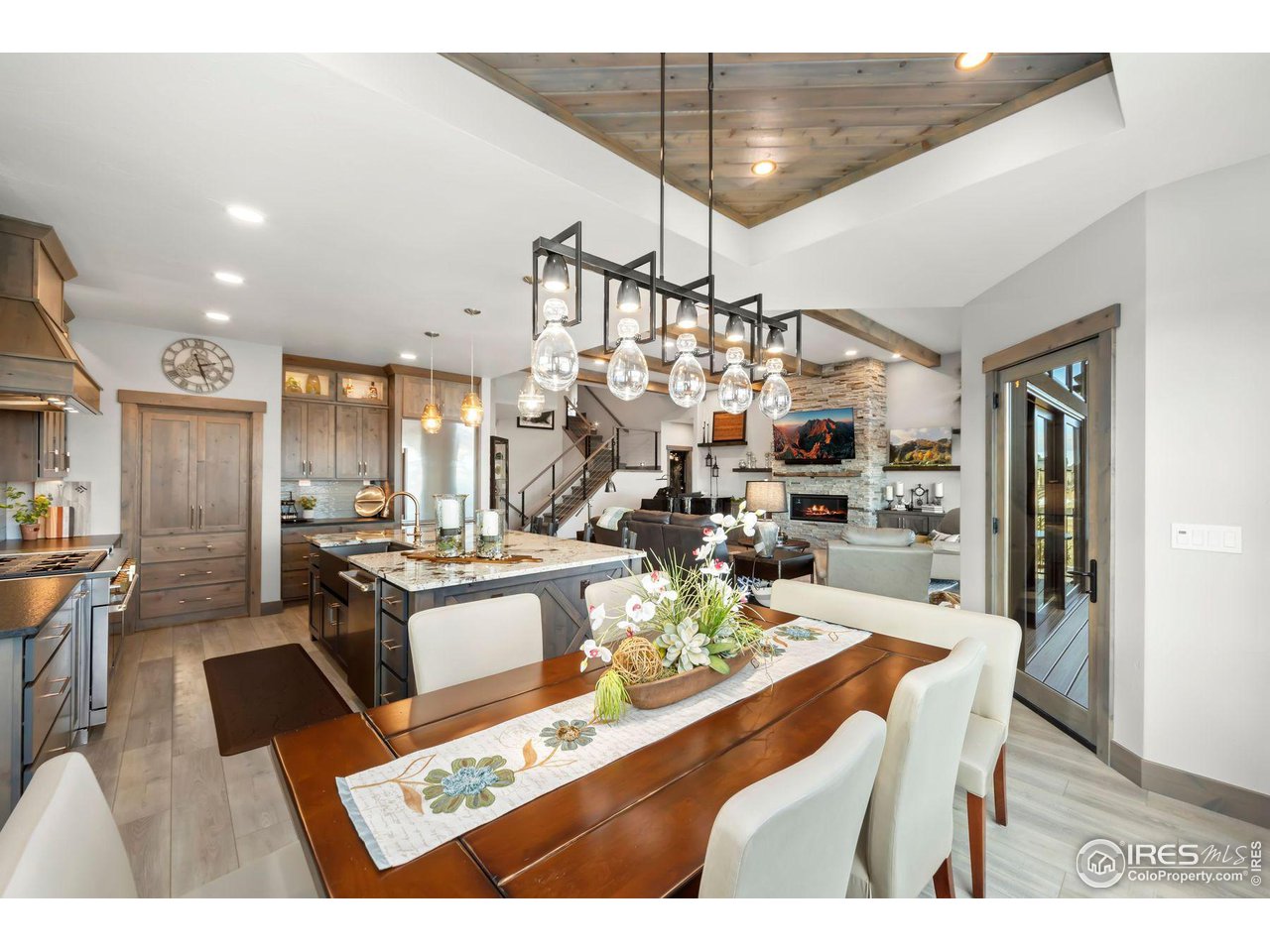 2648 Bluewater Road Berthoud, CO 80513 - Photo 11 of 36 Nook to kitchen and great room