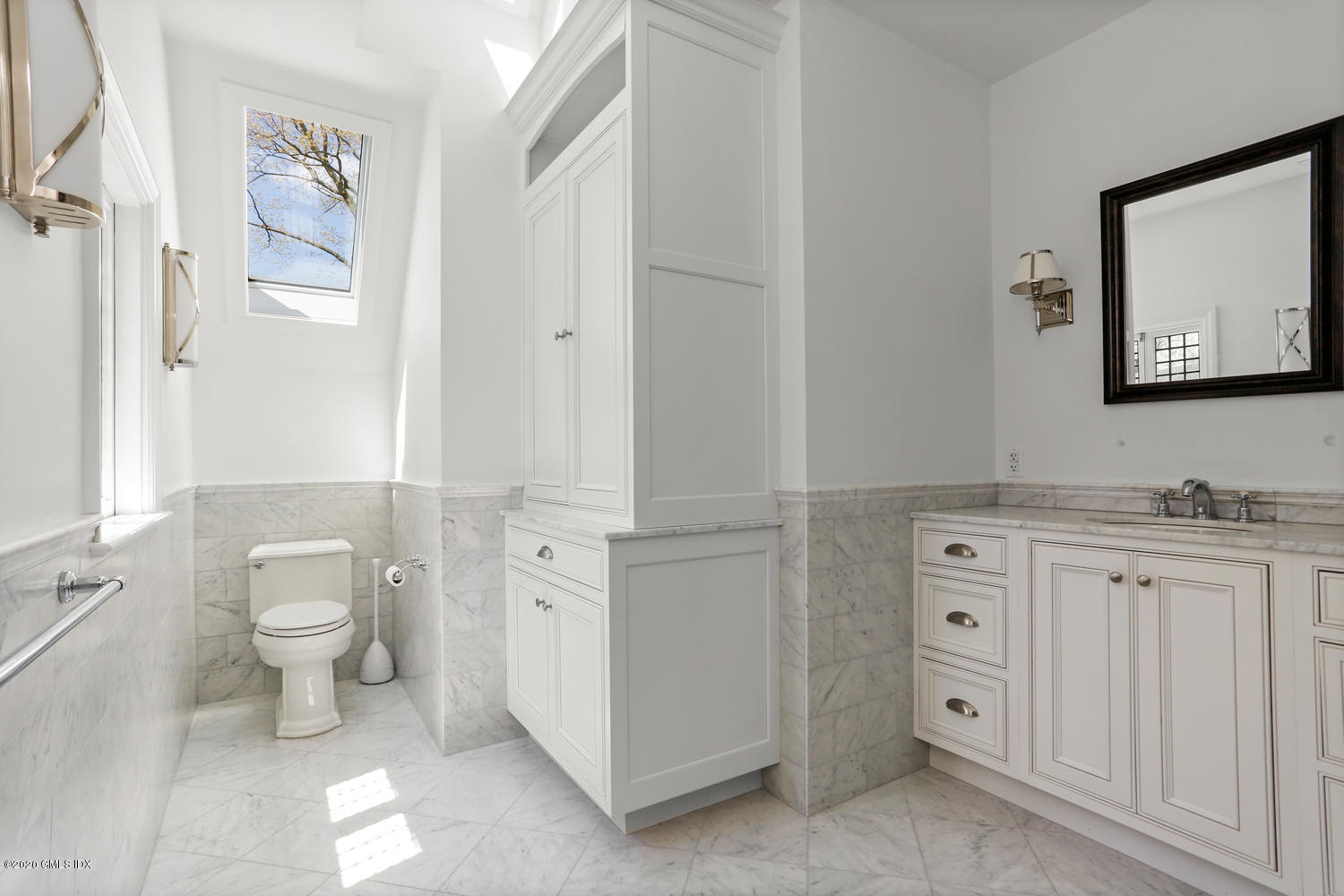 1 Spring Road Greenwich, CT 06830 - Photo 23 of 45 a bathroom with a granite countertop toilet sink and mirror