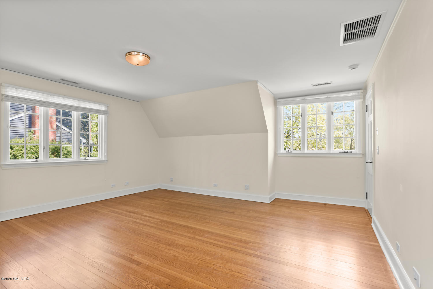 1 Spring Road Greenwich, CT 06830 - Photo 30 of 45 an empty room with a window