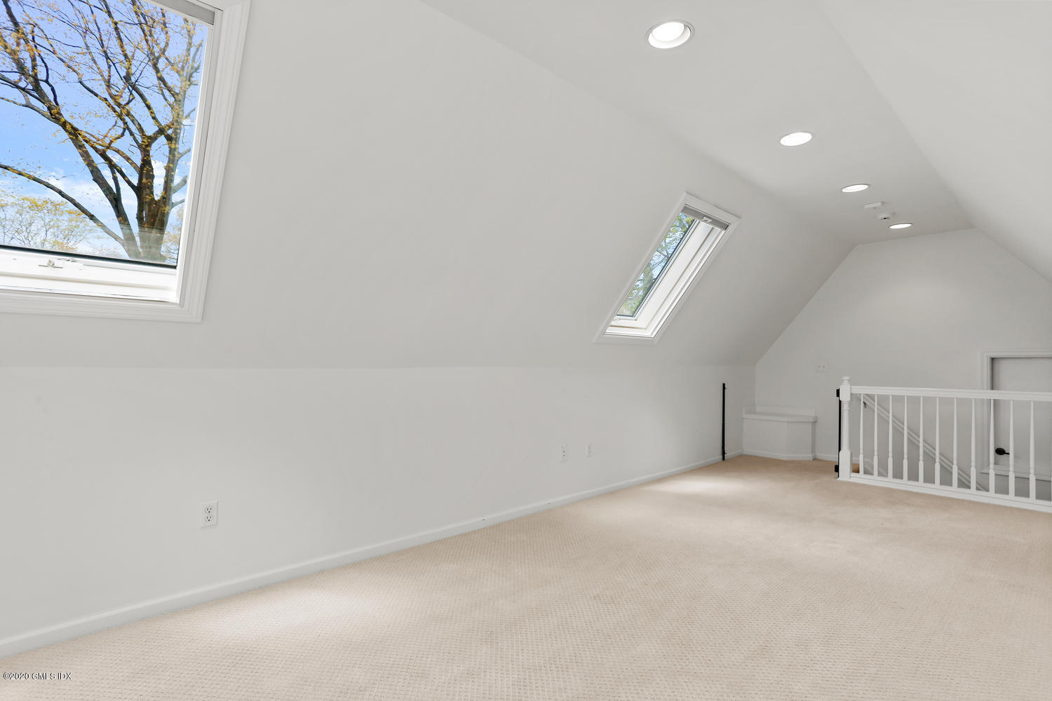 1 Spring Road Greenwich, CT 06830 - Photo 33 of 45 en empty room with windows