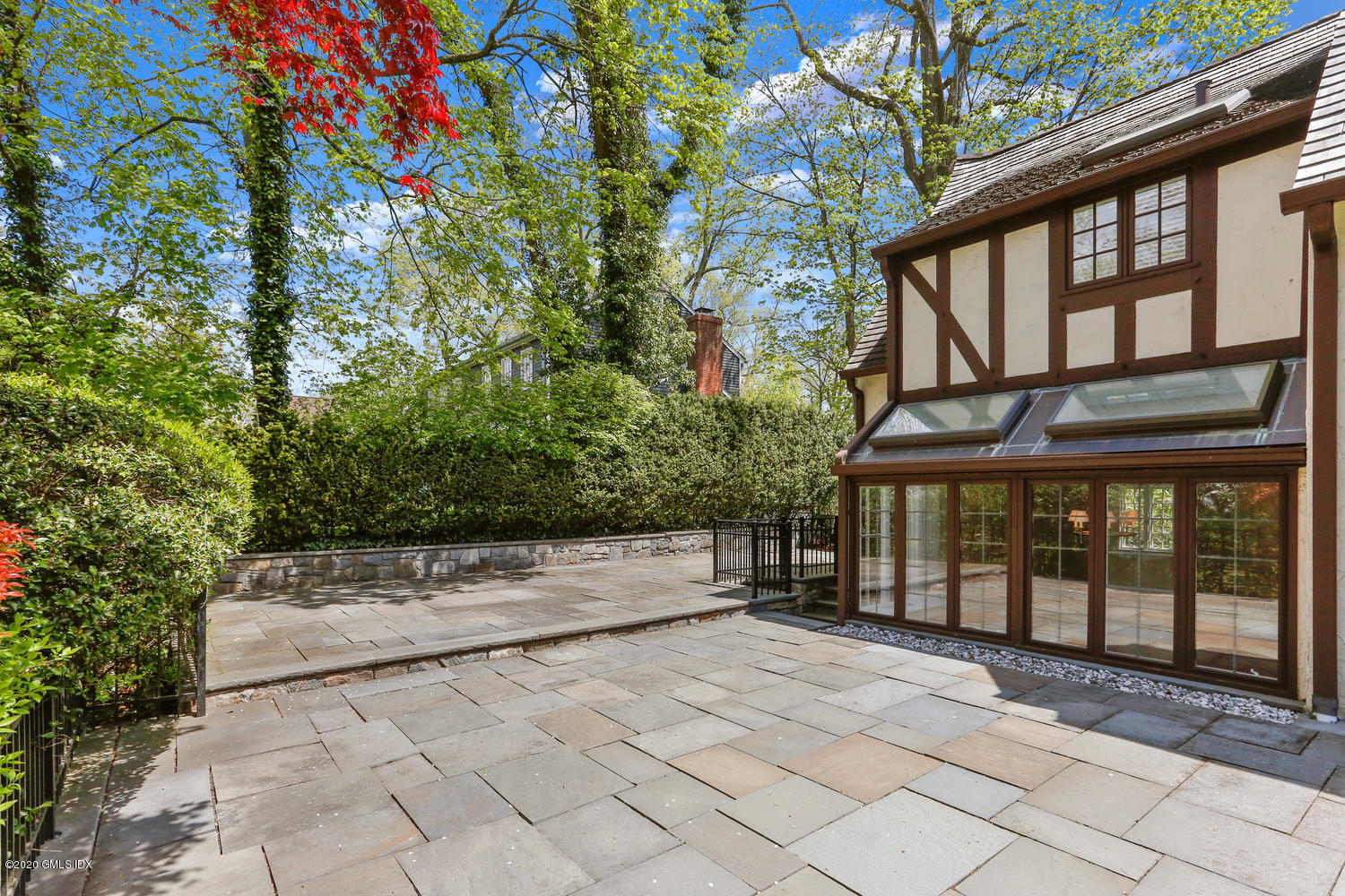 1 Spring Road Greenwich, CT 06830 - Photo 36 of 45 a view of outdoor space with seating area