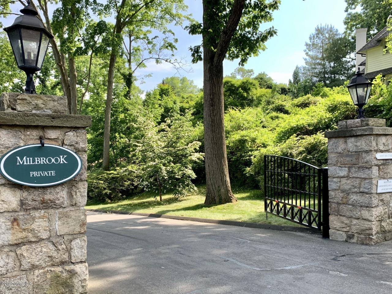 1 Spring Road Greenwich, CT 06830 - Photo 39 of 45 a view of a park with plants and large trees