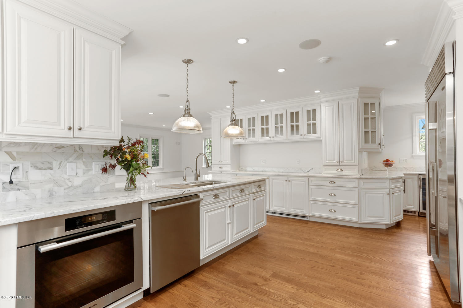 1 Spring Road Greenwich, CT 06830 - Photo 7 of 45 a kitchen with stainless steel appliances granite countertop a sink a stove and a wooden floors