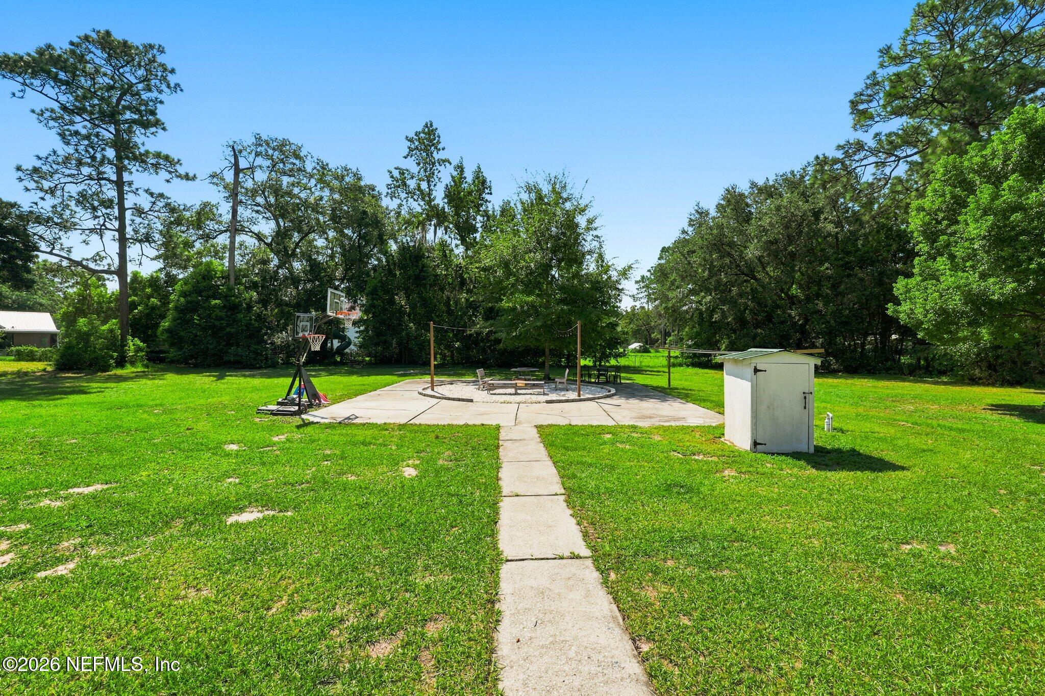 86252 Melissa Road Yulee, FL 32097 - Photo 34 of 40 Outdoor Fire Pit Area