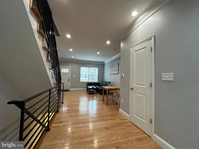 a view of dining room with furniture and a livingroom