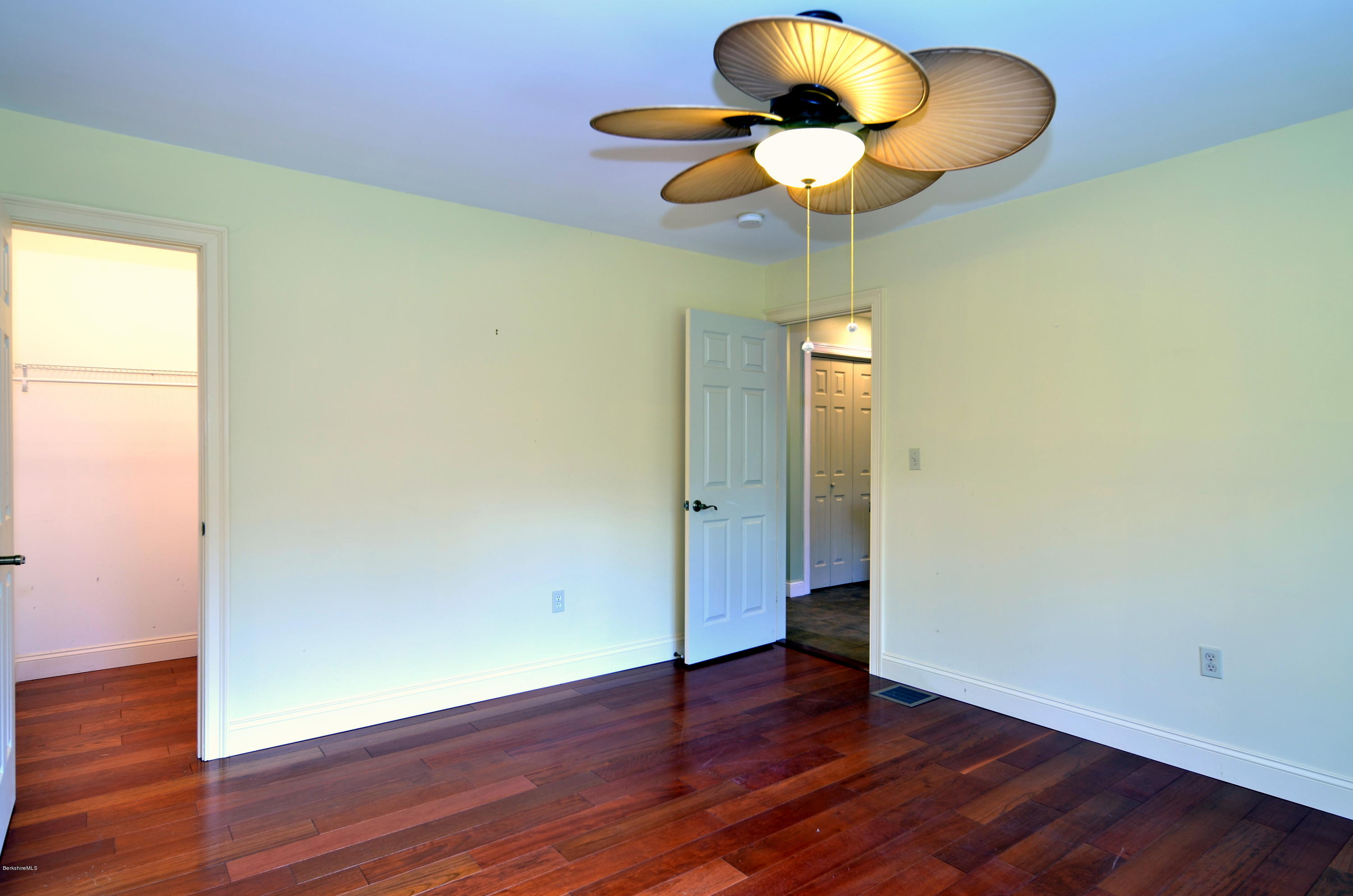 317 Skyline Ridge Road Becket, MA 01223 - Photo 17 of 29 a view of empty room with wooden floor