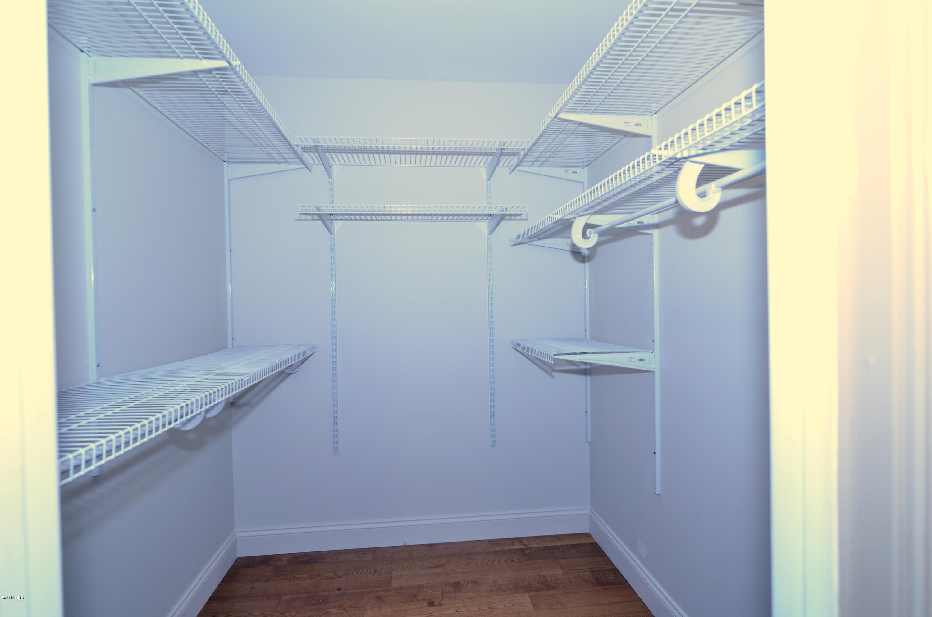 317 Skyline Ridge Road Becket, MA 01223 - Photo 23 of 29 a view of a room with racks on the wall