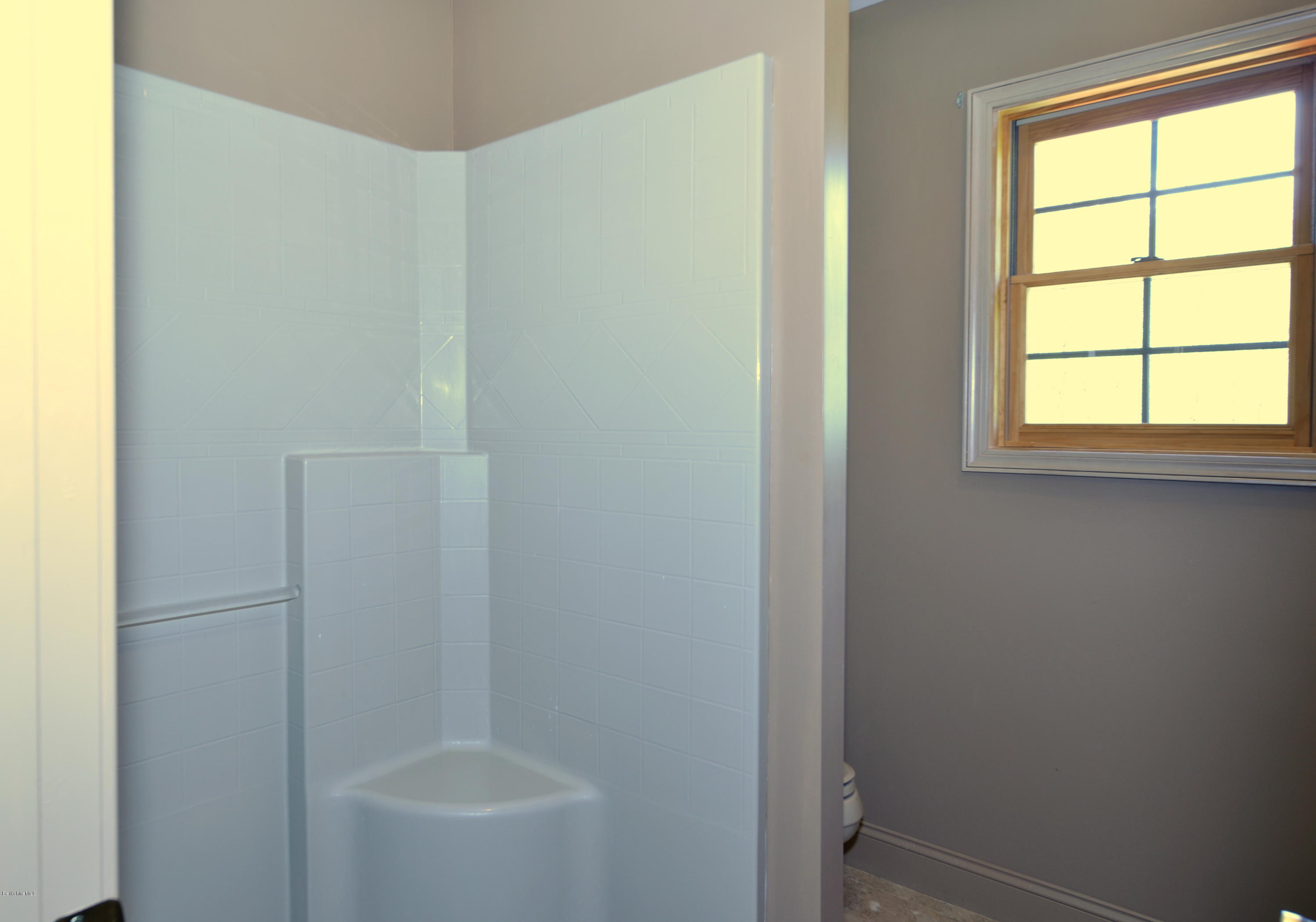 317 Skyline Ridge Road Becket, MA 01223 - Photo 25 of 29 a bathroom with a bathtub