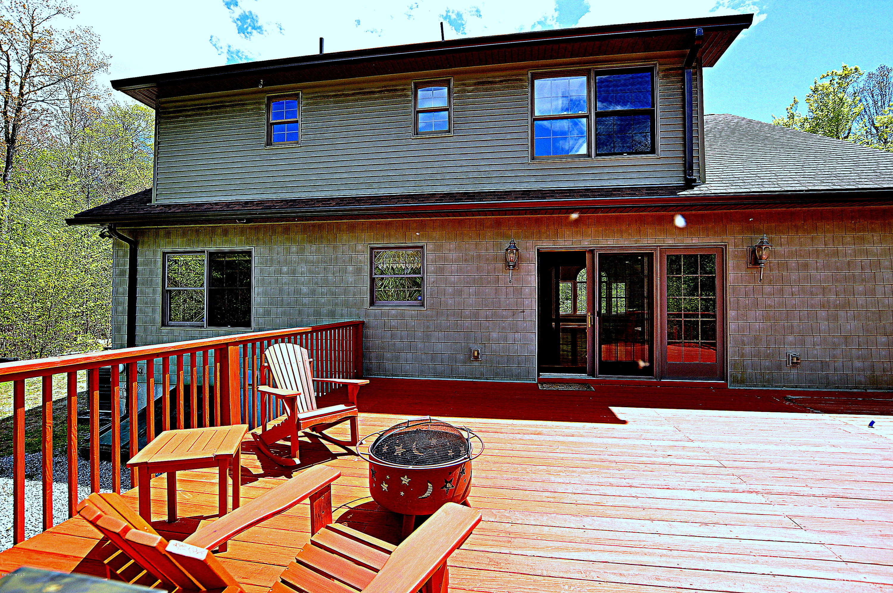 317 Skyline Ridge Road Becket, MA 01223 - Photo 6 of 29 a view of a house with a deck