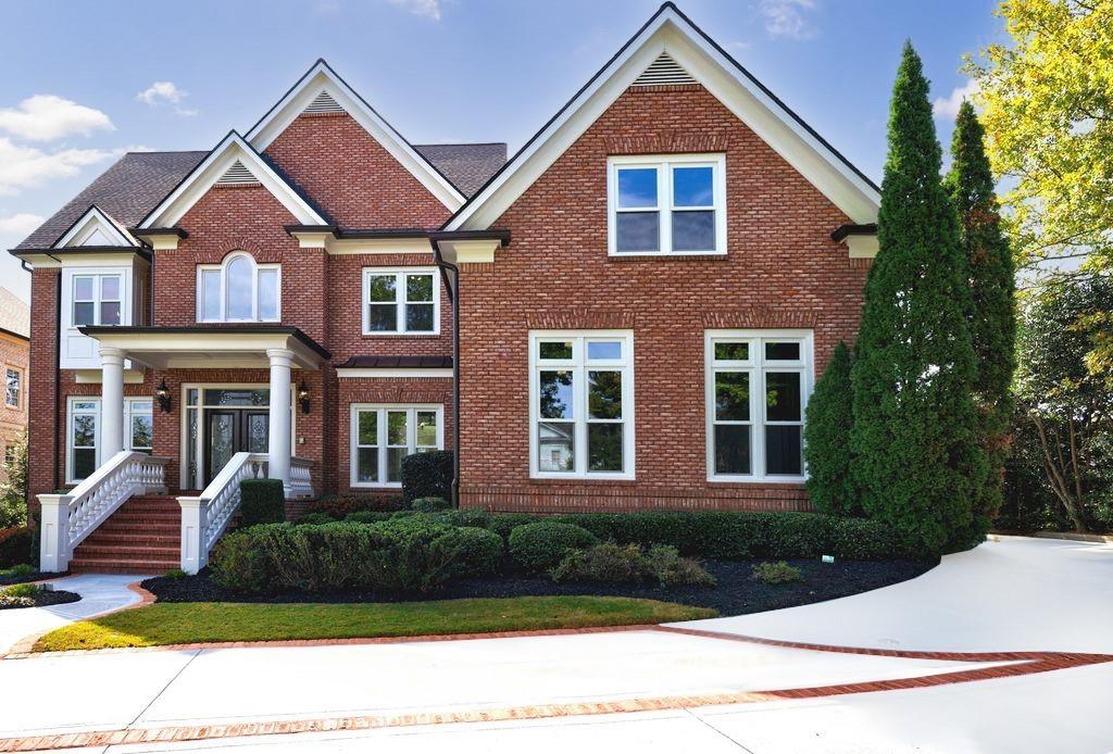 2434 Eudora Way Duluth, GA 30097 - Photo 1 of 1 a front view of a house with a yard