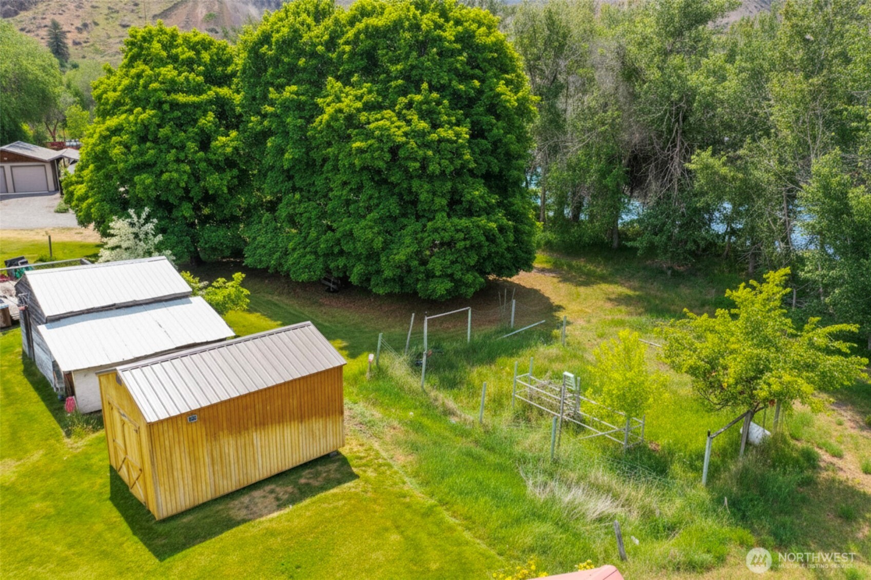 518 Bridge Street Twisp, WA 98856 - Photo 35 of 40 a view of a backyard with chairs