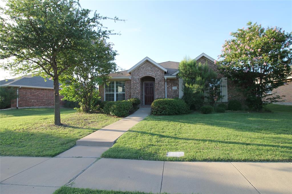 4188 Cherry Ridge Drive Frisco, TX 75033 - Photo 1 of 25 a front view of a house with a yard