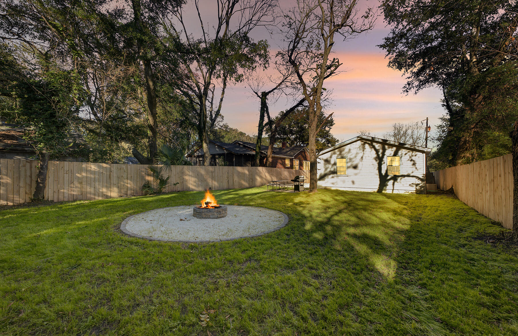 4731 Spruce Street North Charleston, SC 29405 - Photo 5 of 32 evening fire with house