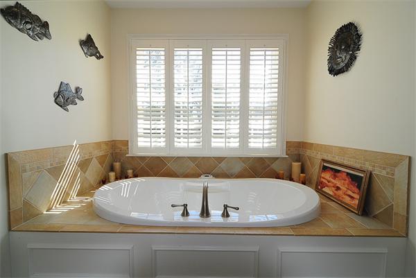 62 Fiske Road Wellesley, MA 02481 - Photo 13 of 25 a bathroom with a bathtub and a window