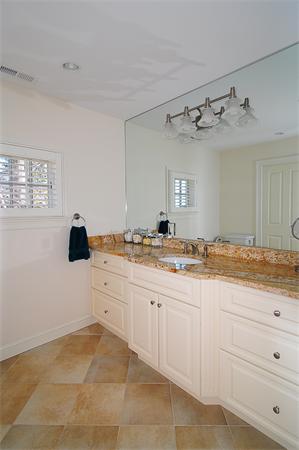 62 Fiske Road Wellesley, MA 02481 - Photo 14 of 25 a bathroom with a sink and a mirror