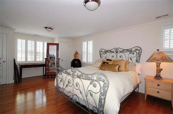 62 Fiske Road Wellesley, MA 02481 - Photo 16 of 25 a bed room with a bed and a chair