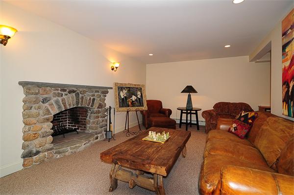 62 Fiske Road Wellesley, MA 02481 - Photo 17 of 25 a living room with furniture and a fireplace
